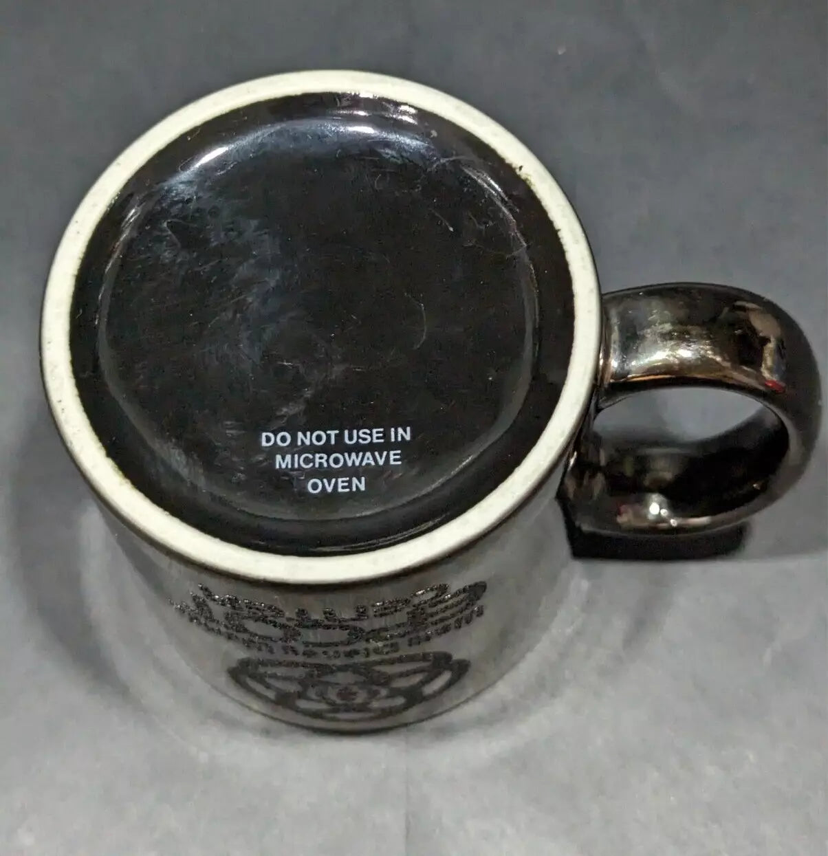 Rare 1980s Walt Disney World Epcot Center smoked chrome mug. Vintage collectible for Disney fans and coffee lovers. Shop now at New, Used and More!