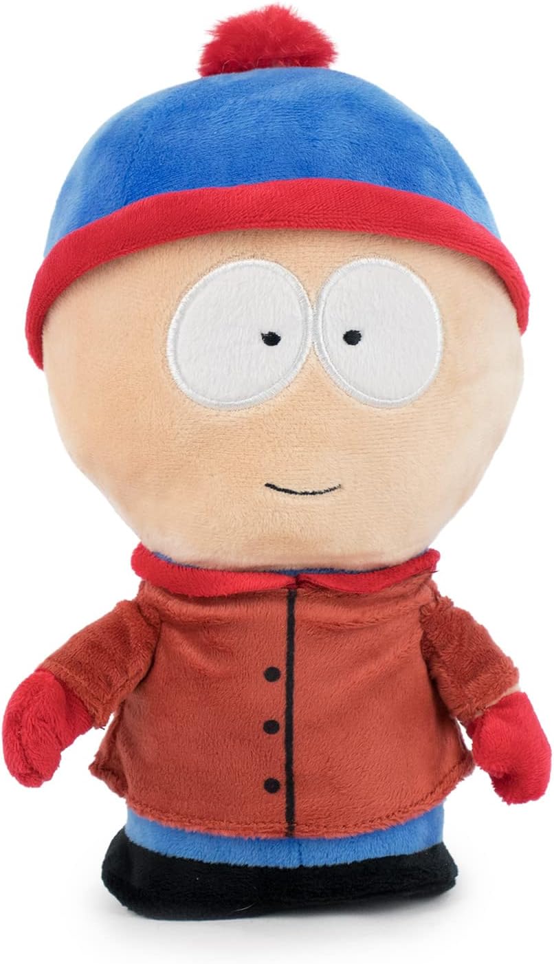 Plush toy of a character from South Park with a blue hat and red jacket on a white background