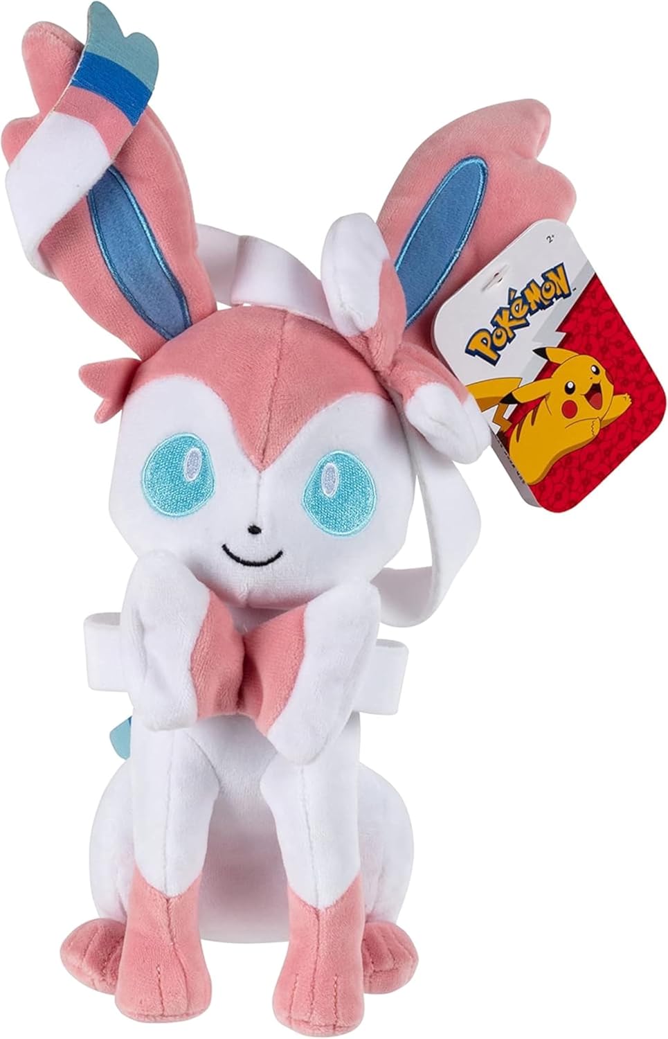 Plush toy of a pink and white creature with blue accents, featuring a Pokémon tag.