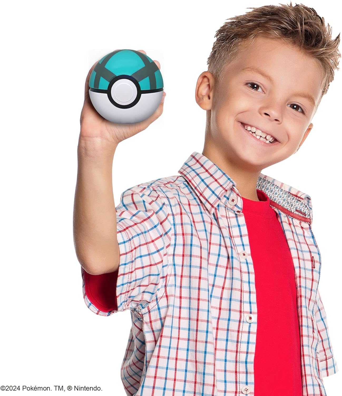 Child holding a Poké Ball with a white background