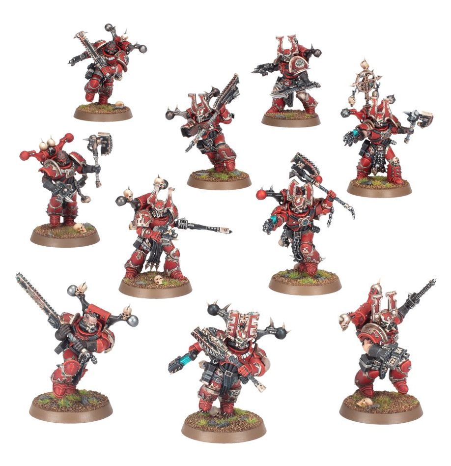 Collection of red and black fantasy warrior figurines on a white background