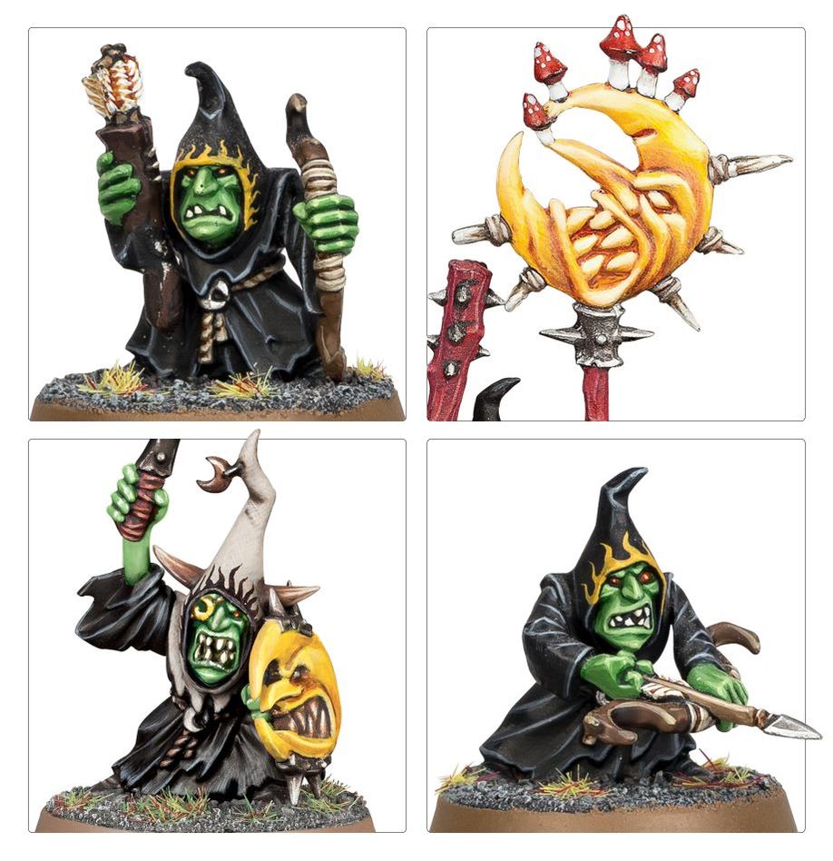 Four fantasy figurines with green skin, black robes, and various weapons on a white background.