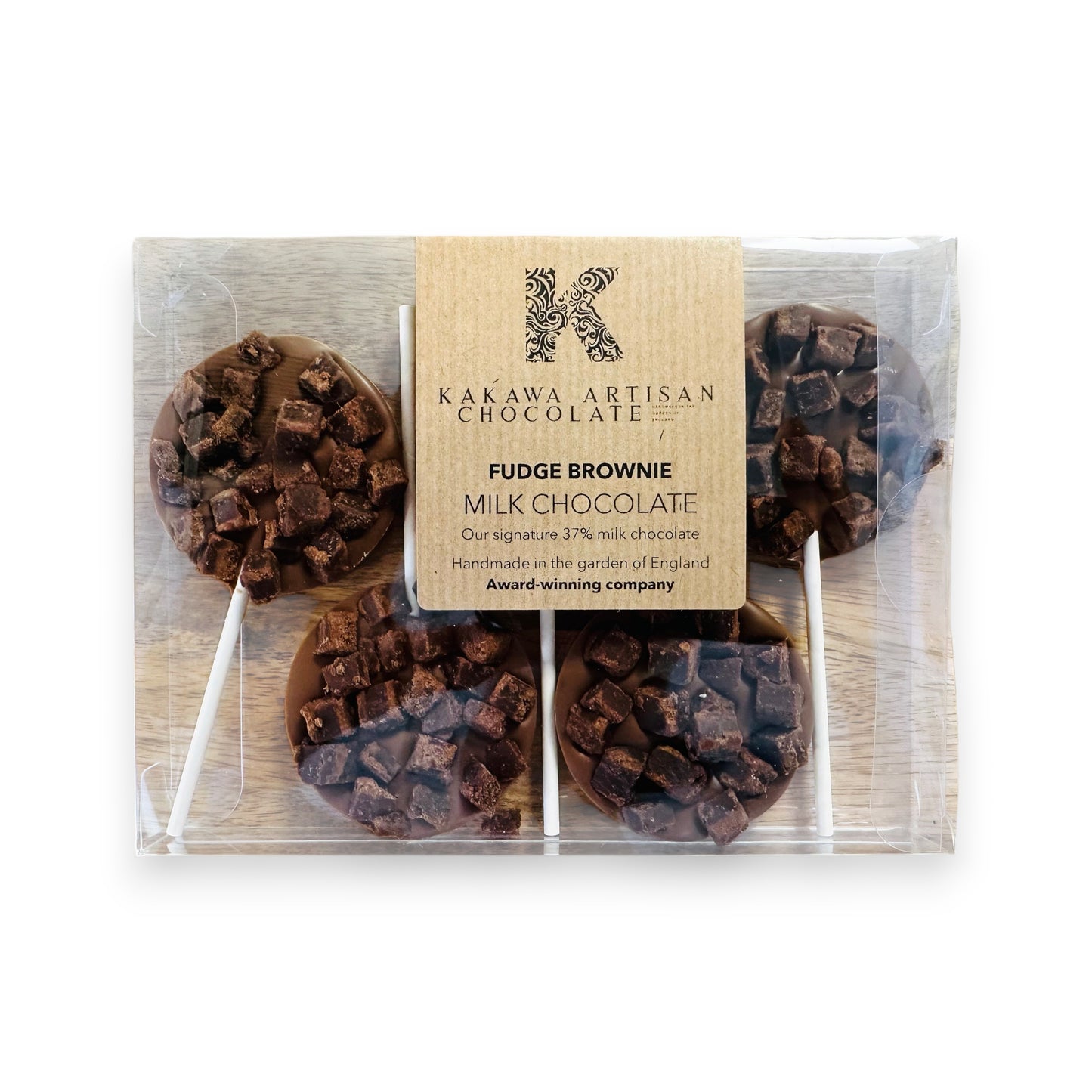 Packaged milk chocolate fudge brownies with Kakawa Artisan Chocolate branding.