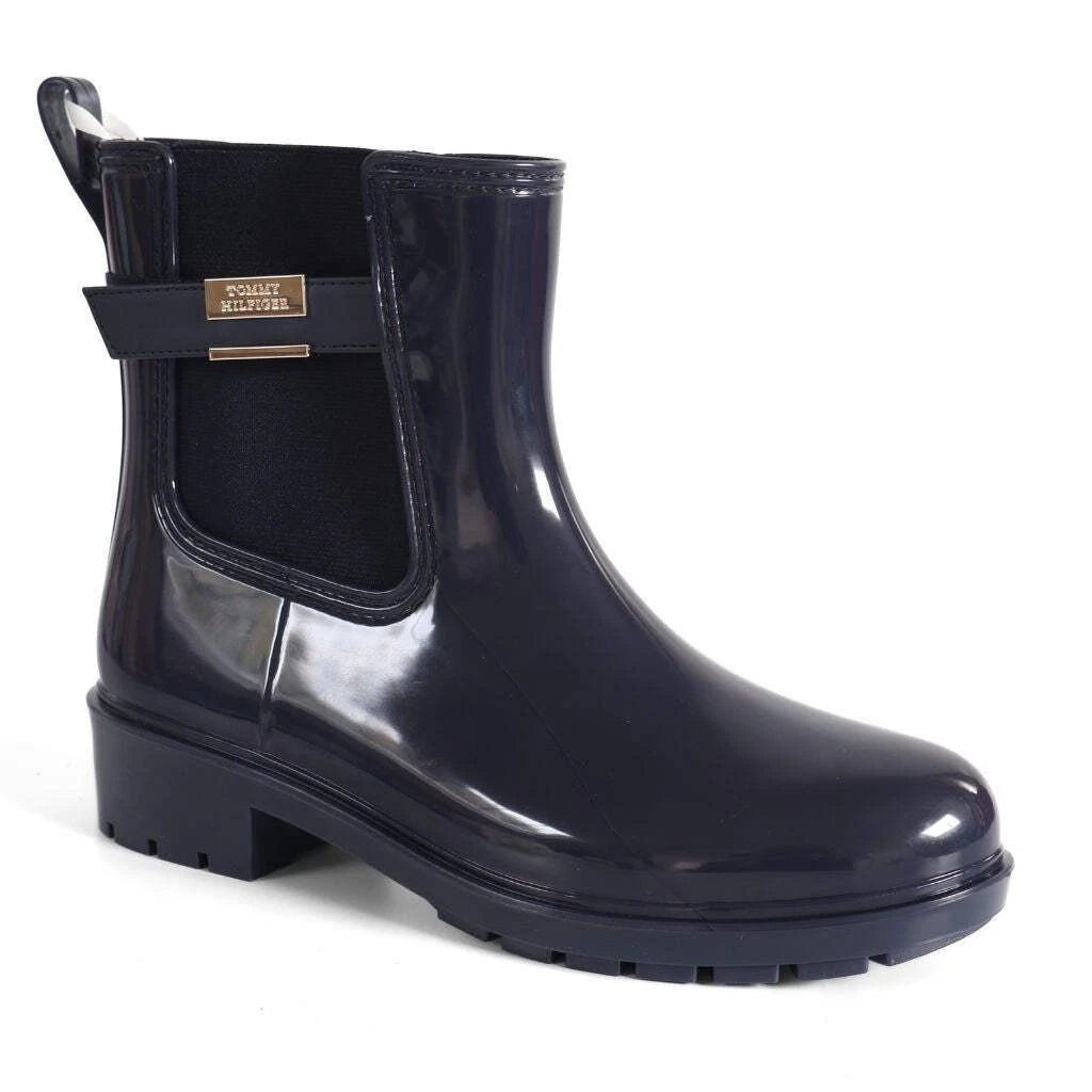 Tommy Hilfiger Women’s Flag Belt Rainboots in Space Blue. Waterproof, stylish & durable for any weather. Shop now at New, Used and More!