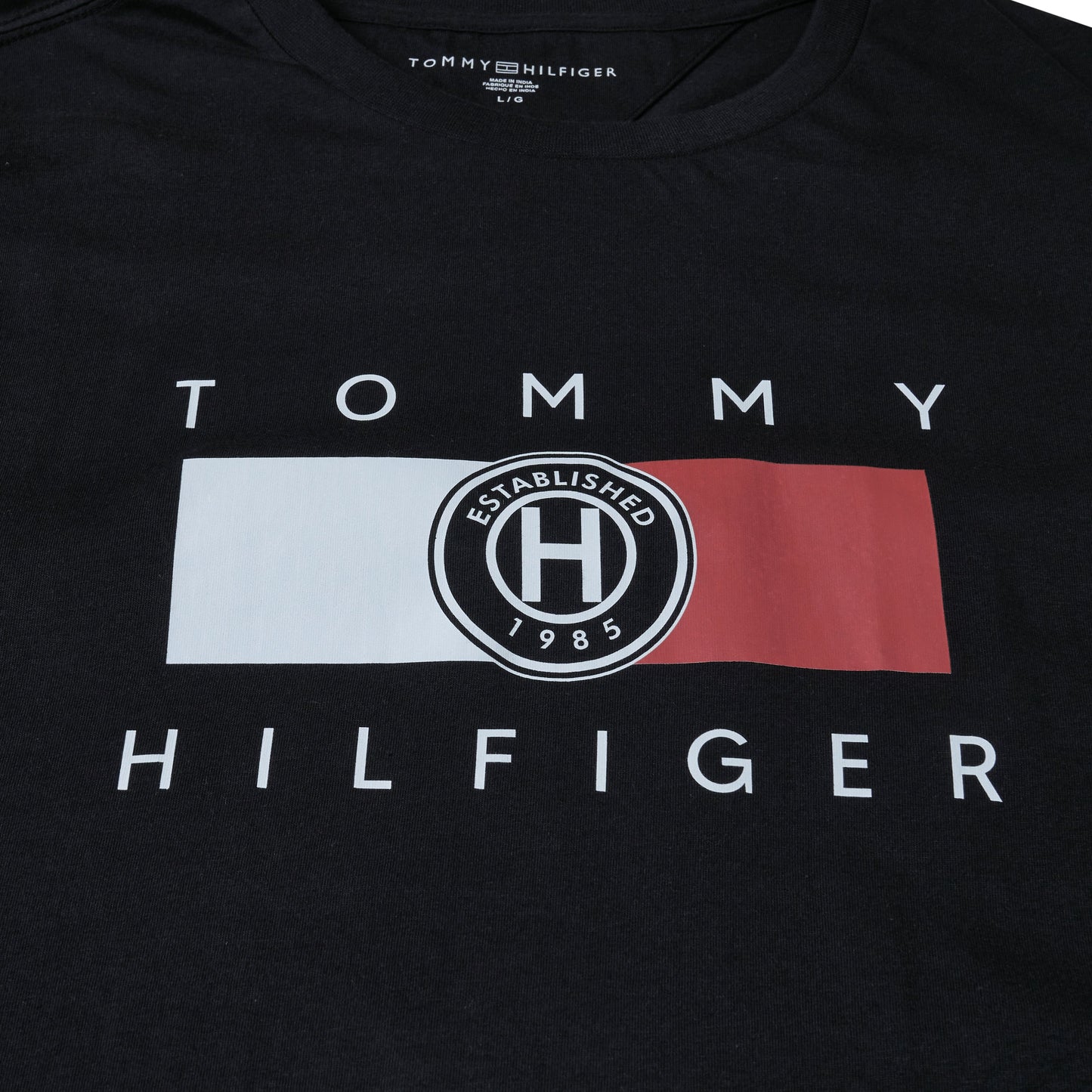 Tommy Hilfiger Graphic Print T-Shirt in soft cotton. Stylish, comfortable & iconic casual wear. Shop premium fashion at New, Used and More!