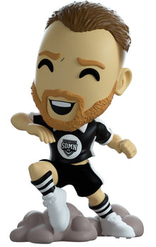 vinyl figure of a football character named 'Behzinga' with branding of YouTooz.