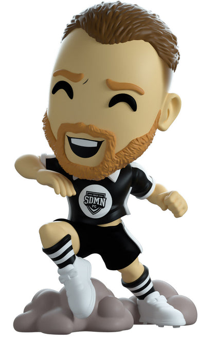 vinyl figure of a football character named 'Behzinga' with branding of YouTooz.