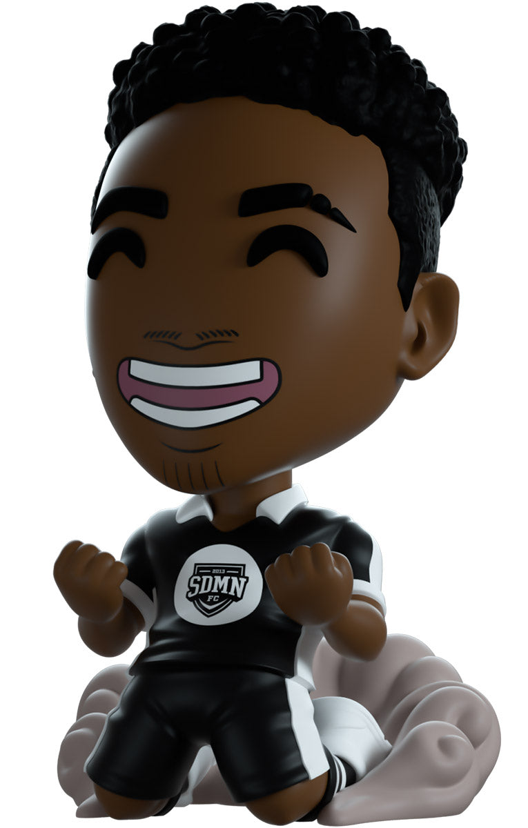 vinyl figure of a character named Tobi with 'YouTooz' branding. Sidemen FC