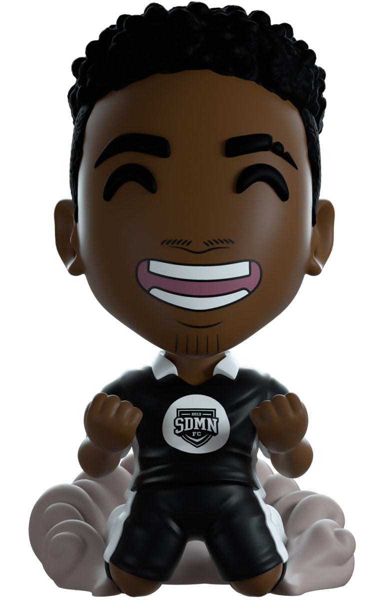 vinyl figure of a character named Tobi with 'YouTooz' branding. Sidemen FC