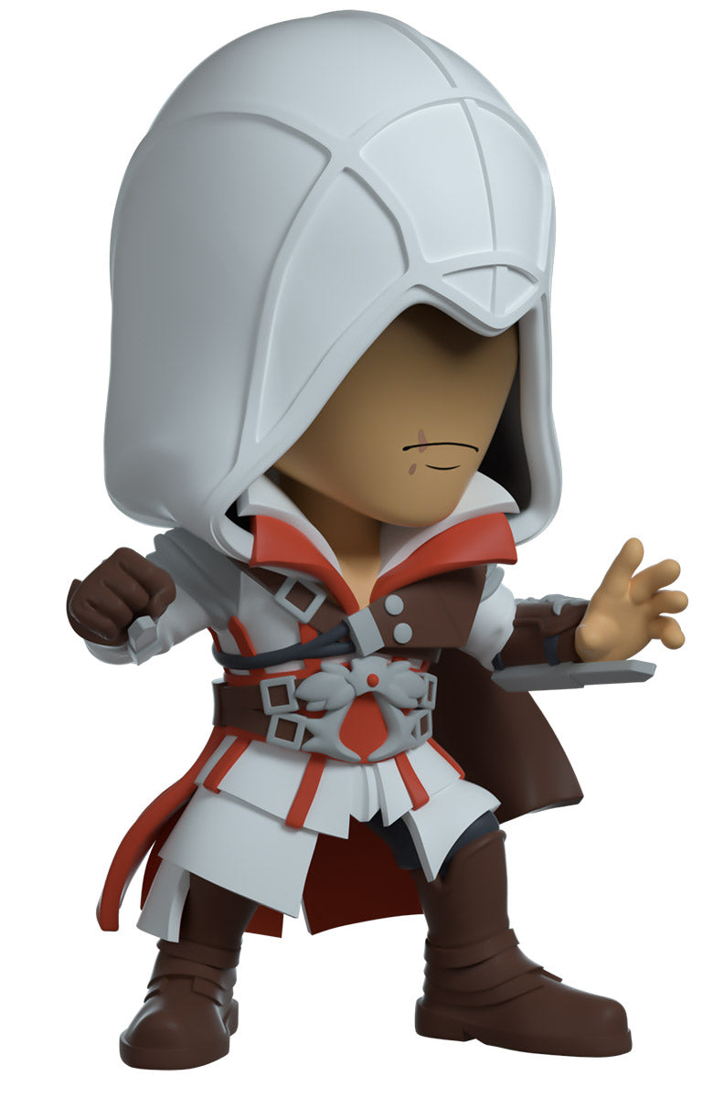 Youtooz - Assassins Creed - Ezio, Figurine of a character in a white hood and brown outfit on a white background