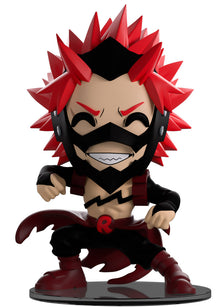Animated character figurine with red spiky hair and black mask on a white background. The Vinyl figure of Eijiro Kirishima from YouTooz 
