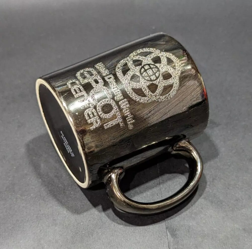 Rare 1980s Walt Disney World Epcot Center smoked chrome mug. Vintage collectible for Disney fans and coffee lovers. Shop now at New, Used and More!