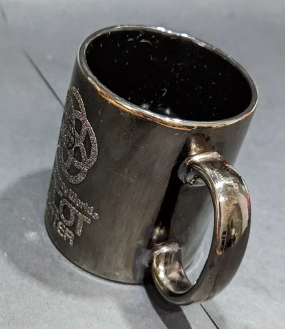 Rare 1980s Walt Disney World Epcot Center smoked chrome mug. Vintage collectible for Disney fans and coffee lovers. Shop now at New, Used and More!