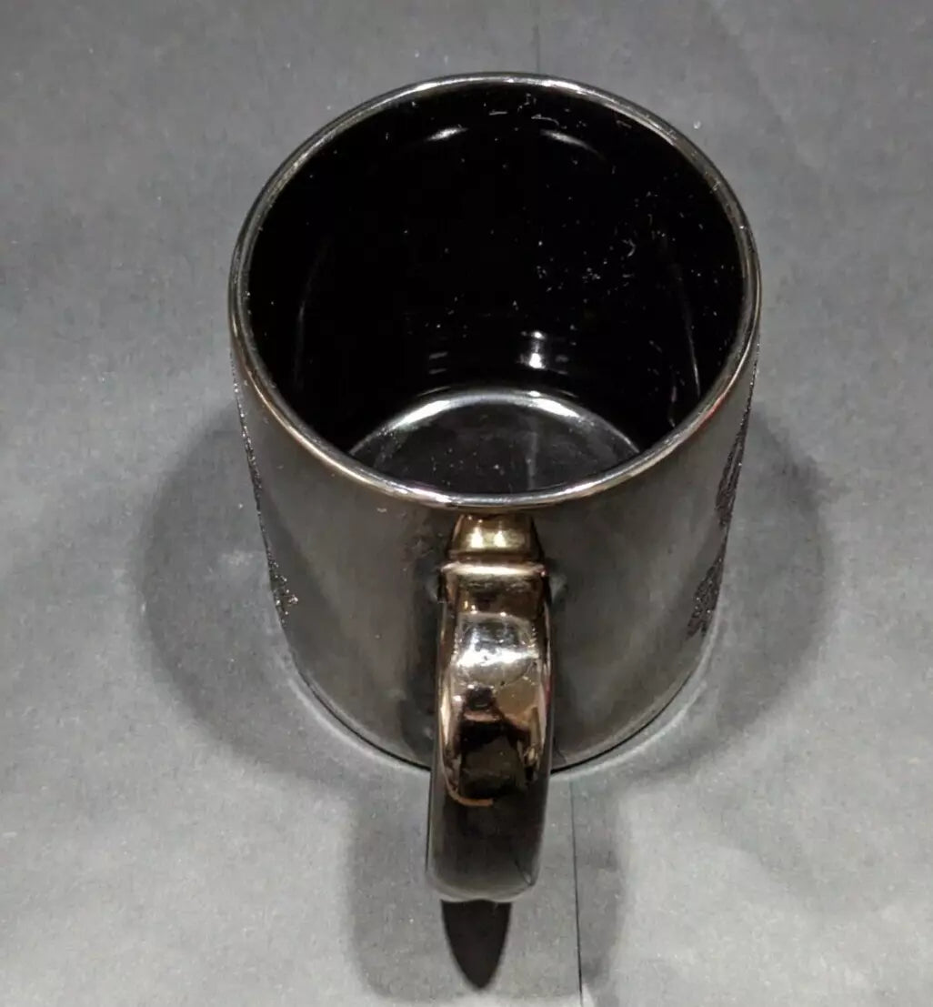 Rare 1980s Walt Disney World Epcot Center smoked chrome mug. Vintage collectible for Disney fans and coffee lovers. Shop now at New, Used and More!