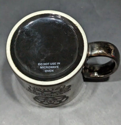 Rare 1980s Walt Disney World Epcot Center smoked chrome mug. Vintage collectible for Disney fans and coffee lovers. Shop now at New, Used and More!