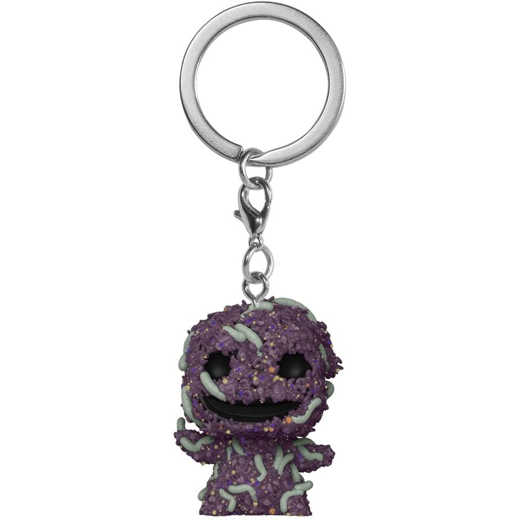 Purple glittery keychain with a character design on a white background