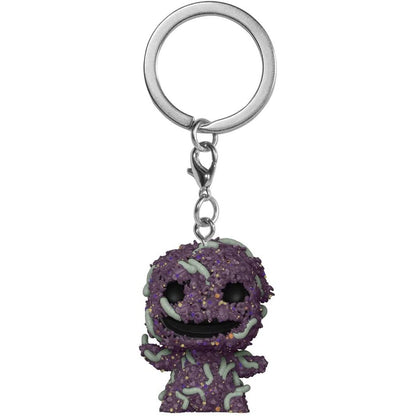 Purple glittery keychain with a character design on a white background