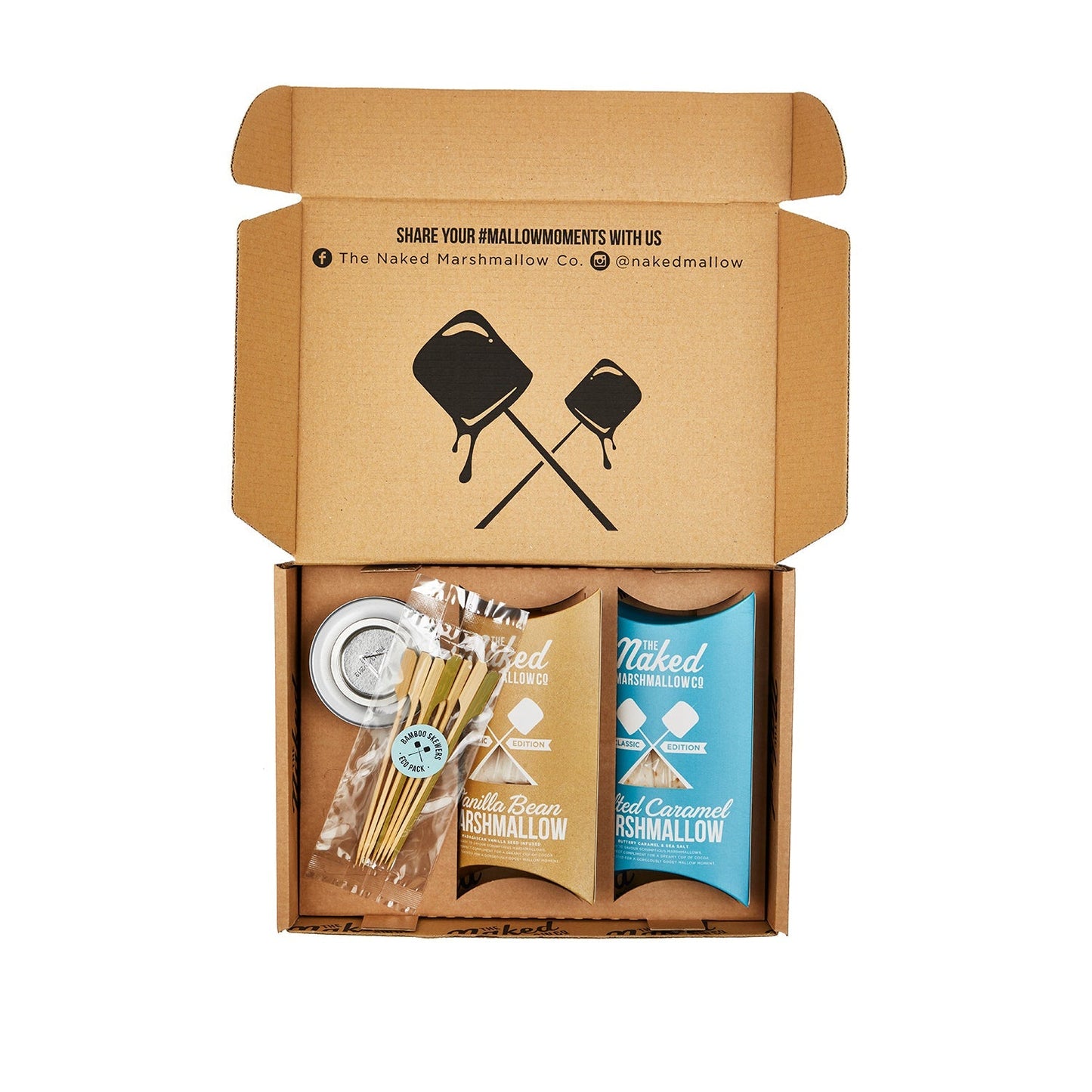 Naked Marshmallow Co packaging with marshmallows, sticks, and a container on a white background