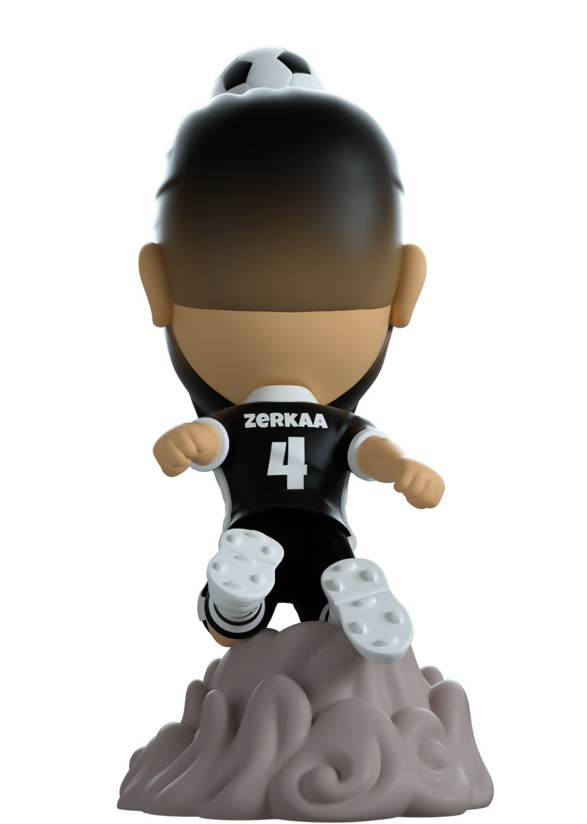 Figurine of a soccer player in a black and white uniform with 'Zerkaa' branding on a white background.