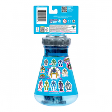 Toy figure in a blue transparent dome packaging with colorful figures on the back, on a white background.