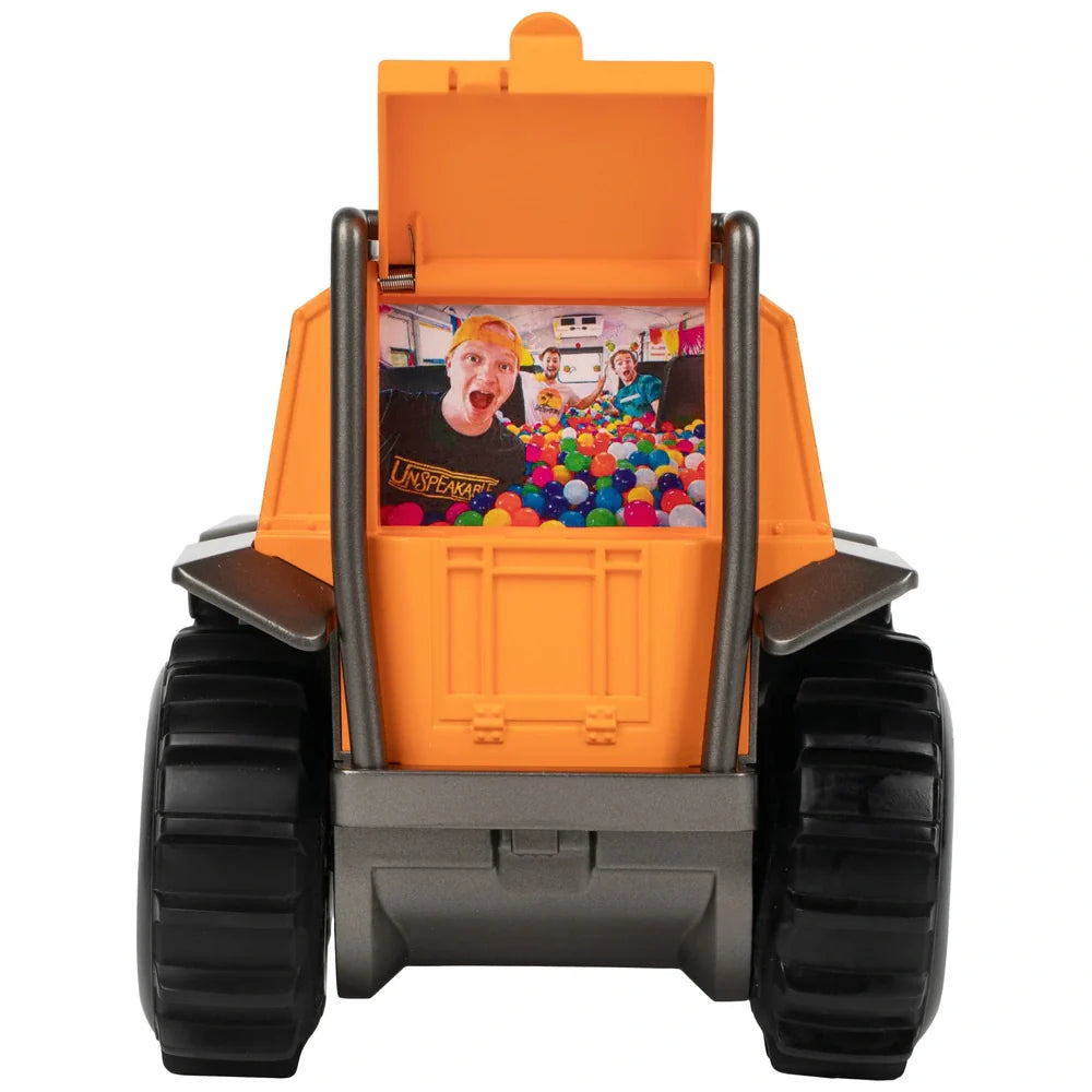 Toy construction vehicle with a colorful ball pit inside, featuring a character on a card.