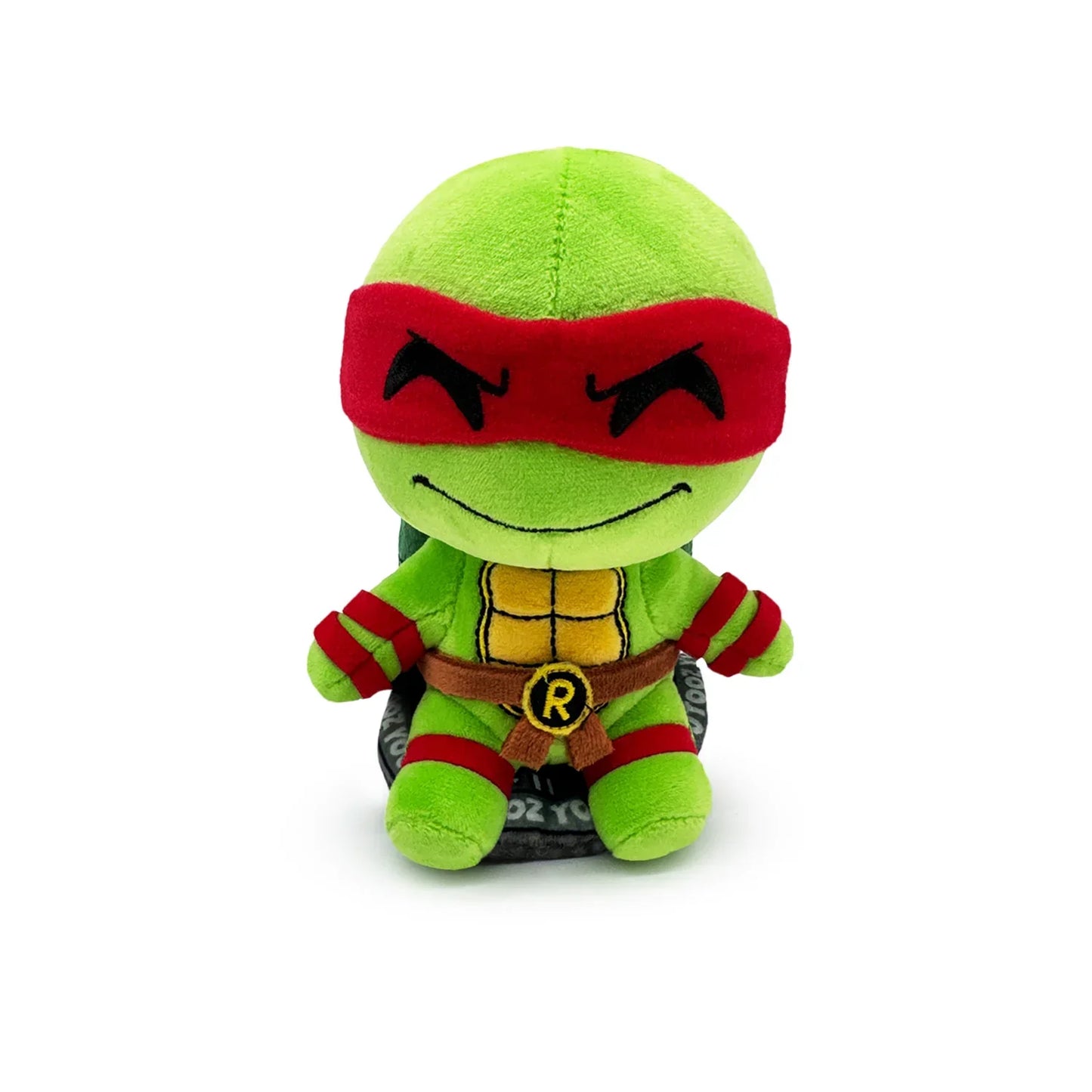 TMNT Plush toy of a green turtle character with red mask on a white background