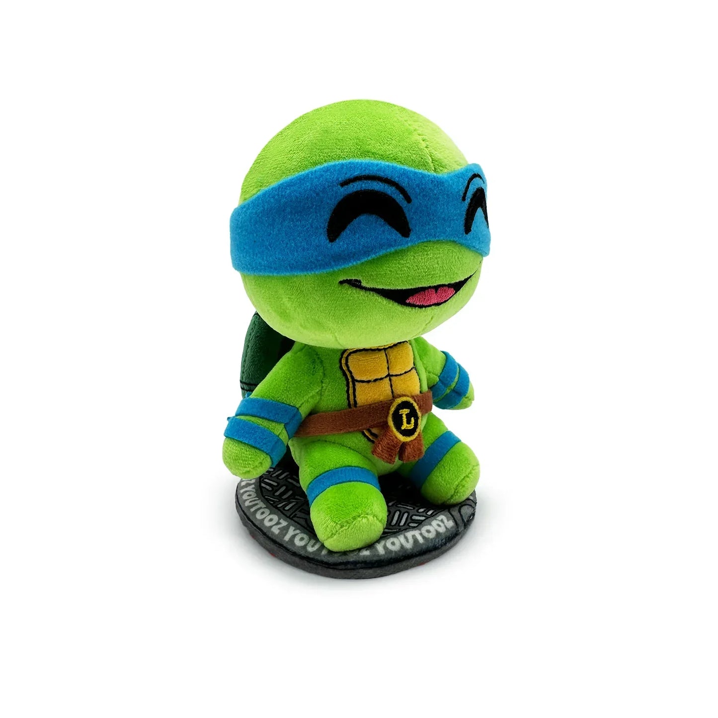 TMNT Plush toy of a green turtle character with a blue mask on a white background