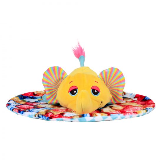 Colorful plush fish toy on a patterned rug with a white background