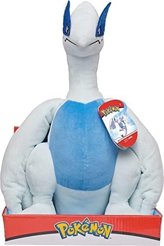 Plush toy of a Pokémon character Lugia with a red tag and box on a white background