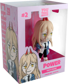 YouTooz vinyl figure 'Power' and packaging with character illustration on pink background