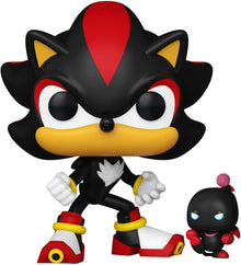 Black and red character figurine with smaller figure on a white background