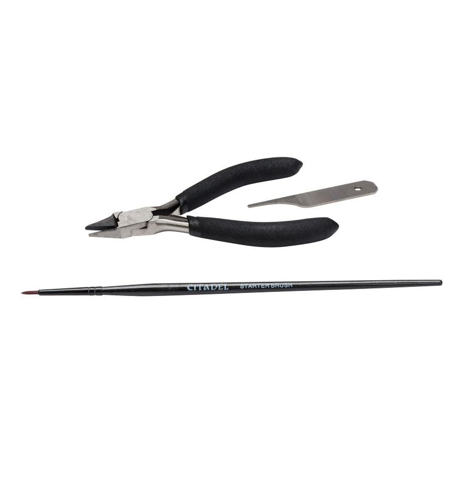 Pair of pliers with black handles and a brush on a white background