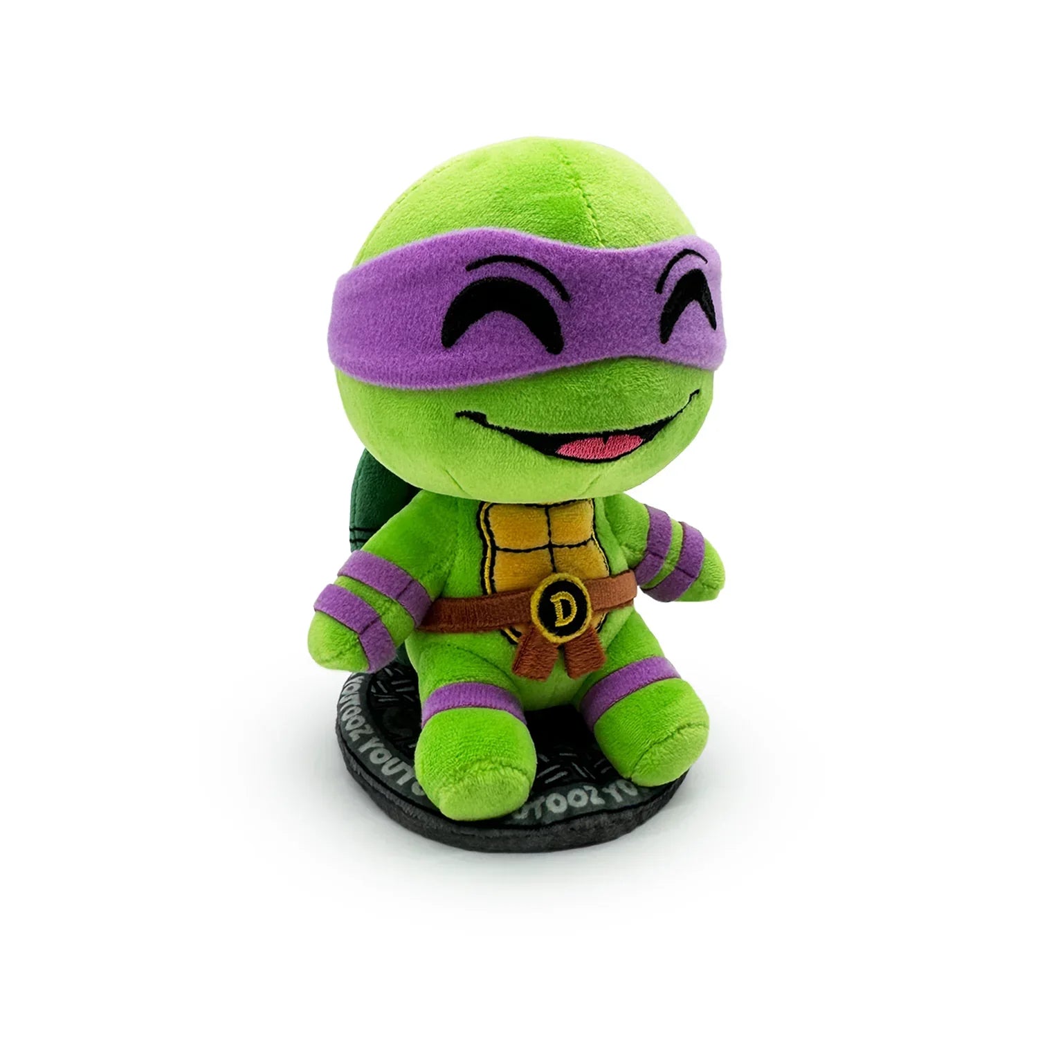 TMNT Green plush toy with purple mask on a white background