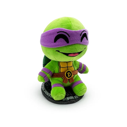 TMNT Green plush toy with purple mask on a white background