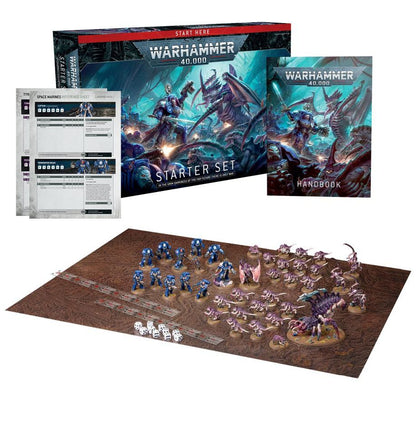 Warhammer 40,000 starter set with miniatures and game components on a white background