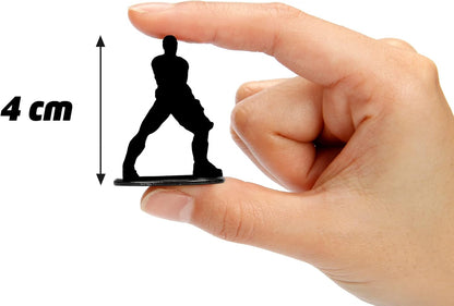 Hand holding a small black figurine with a measurement label indicating 4 cm on a white background