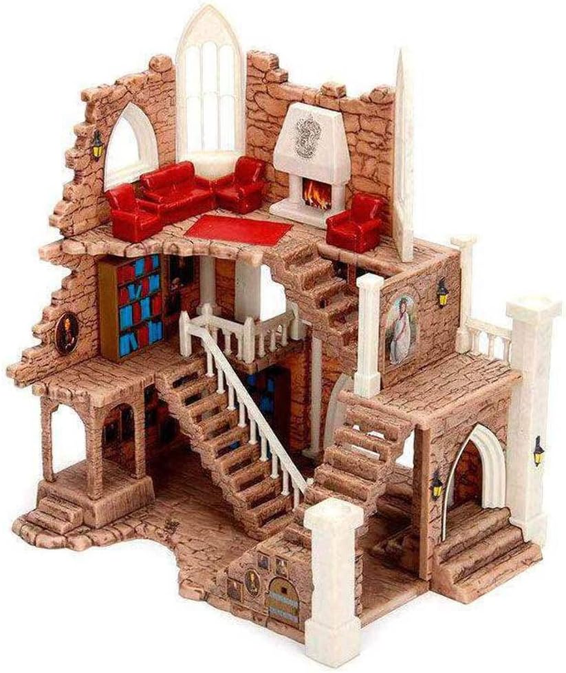 Toy house with detailed interior and furniture on a white background
