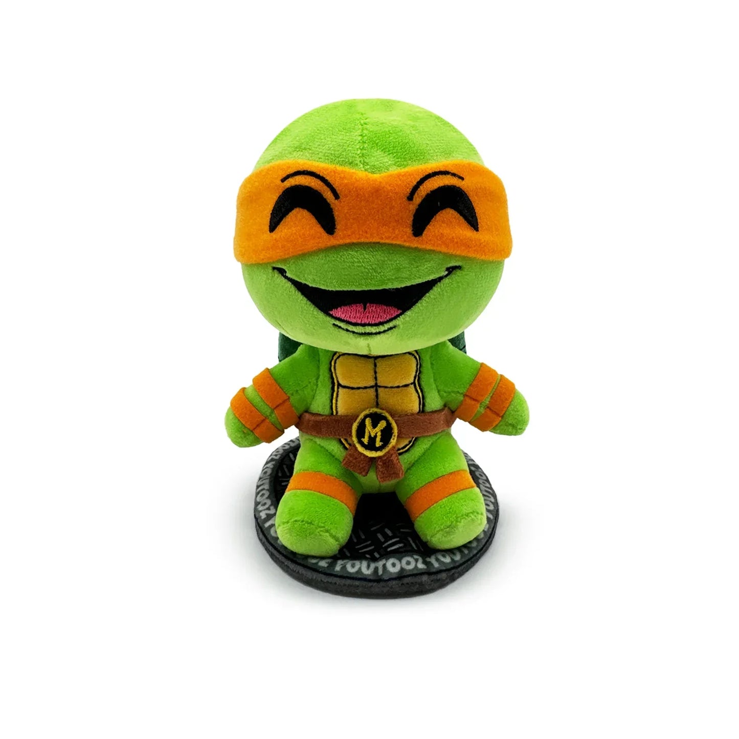 TMNT Green plush toy with orange mask on a white background