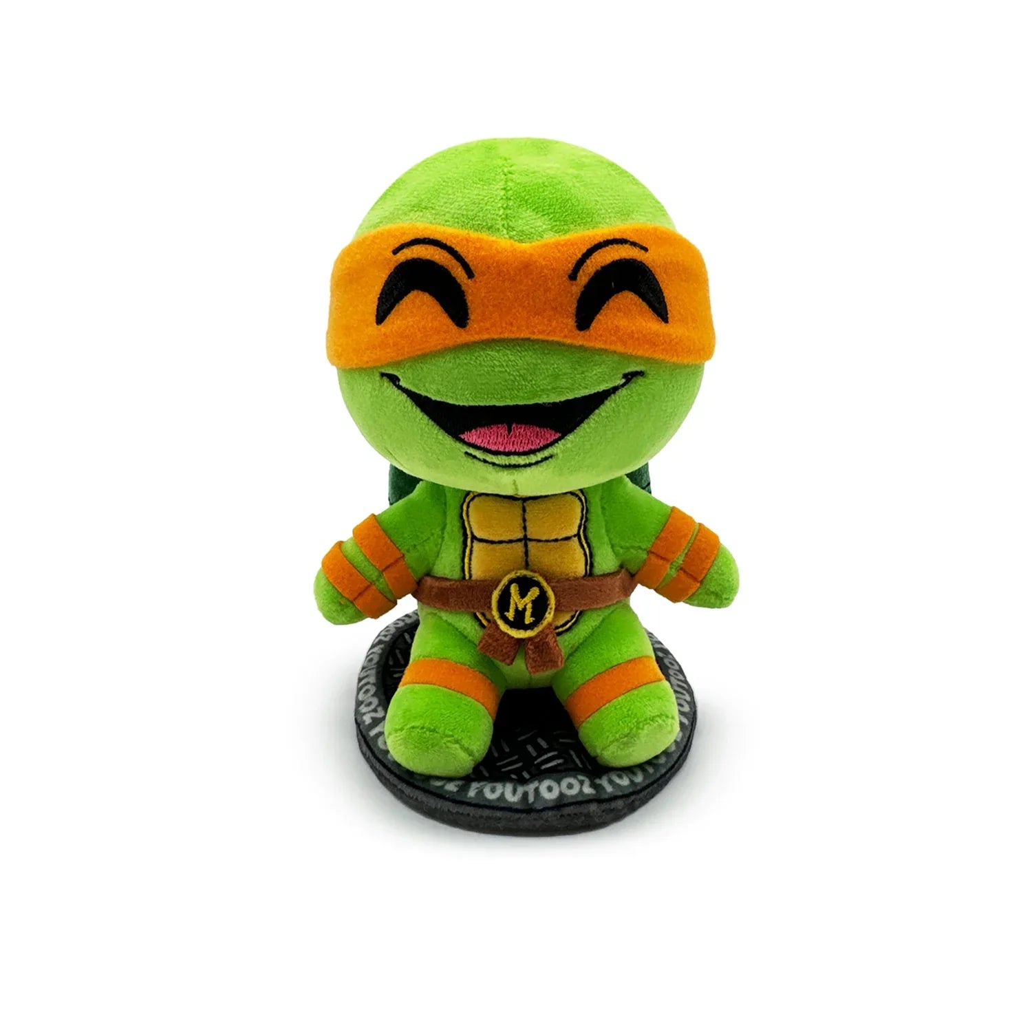 TMNT Green plush toy with orange mask on a white background
