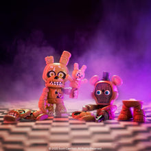 Three toy figures with a dark, smoky background and purple lighting.