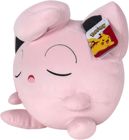 Pokémon Jigglypuff Sleeping Plush with a tag featuring a cartoon character on a white background