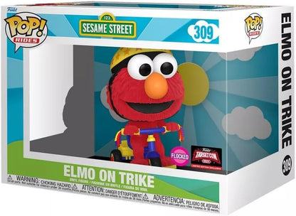 Funko Pop! packaging of Elmo on a trike with Sesame Street branding.