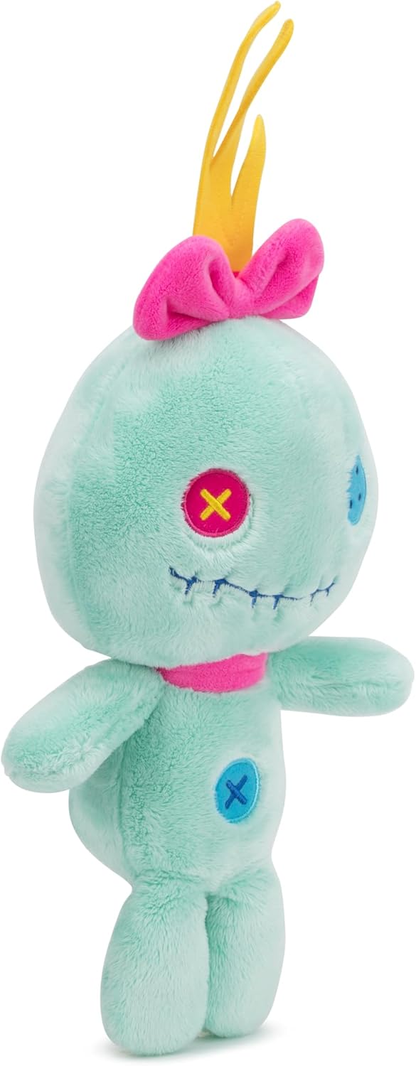 Disney Scrump Plush toy with teal body, pink bow, and blue eyes on a white background
