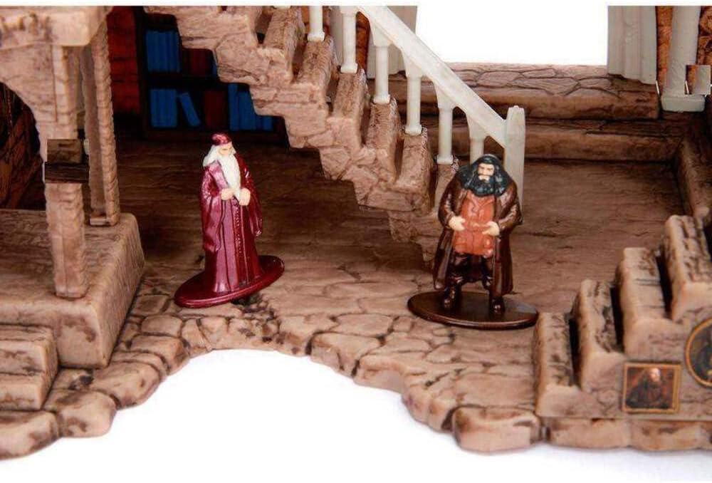 Two figurines on a detailed wooden staircase model