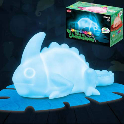 Colour-changing chameleon toy with glowing effect on a dark background