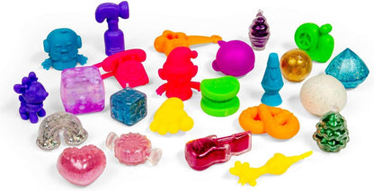 Assorted colorful plastic toys on a white background