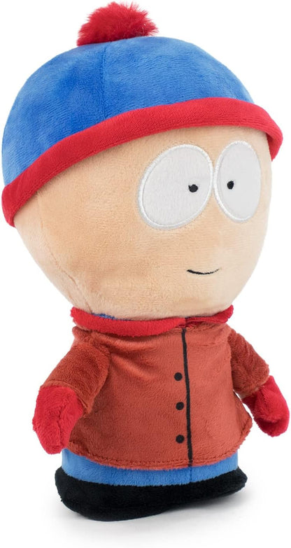 Plush toy of a character from South Park with a blue hat and red jacket on a white background