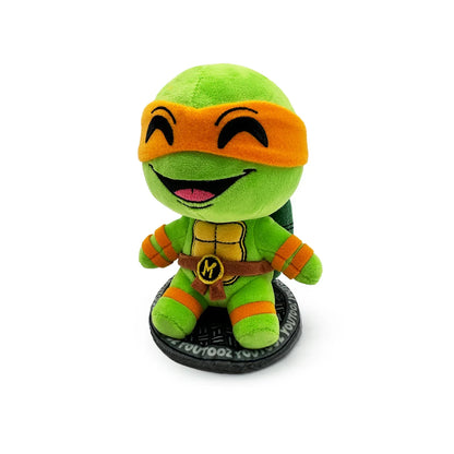 TMNT Green plush toy with orange mask on a white background