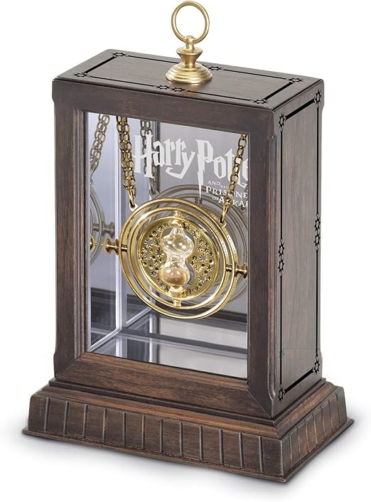 Harry Potter-themed time-turner necklace in a wooden display case on a white background