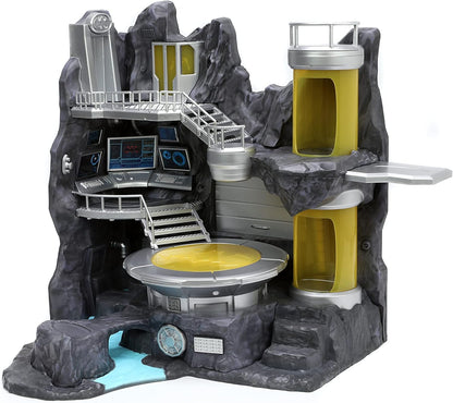 Toy playset with rocky landscape, platforms, and control panels on a white background